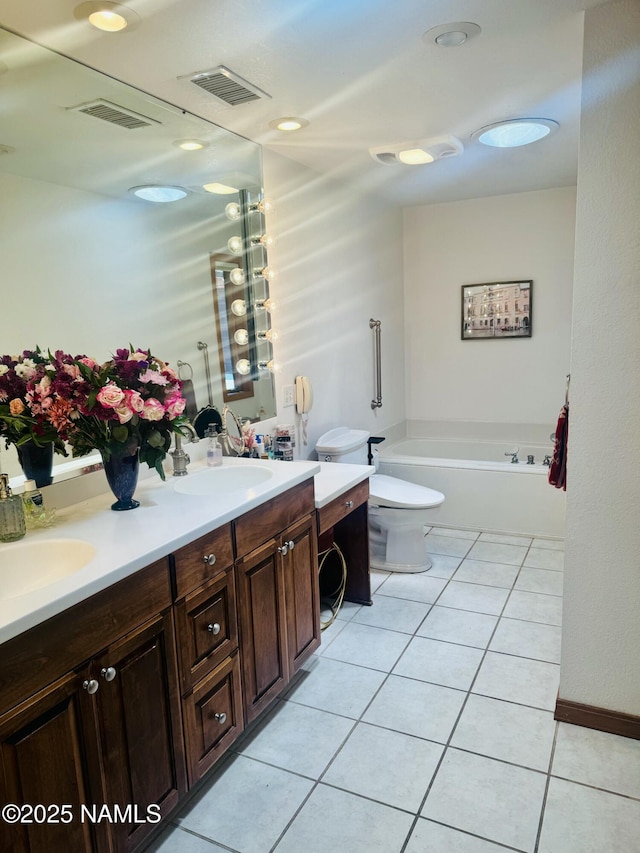 5070 N Weatherford Rd, Flagstaff, AZ 86001 - full bath with double vanity, tile patterned flooring, and a garden tub