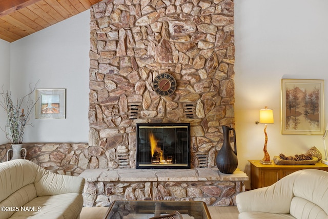 2468 N Strawberry Way, Flagstaff, AZ 86004 - living room featuring a stone fireplace and lofted ceiling