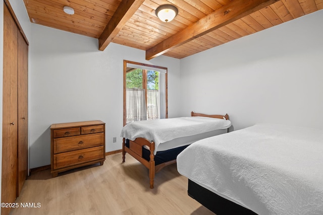 2468 N Strawberry Way, Flagstaff, AZ 86004 - bedroom featuring light wood-type flooring, wood ceiling with exposed beams, baseboards, and access to outside