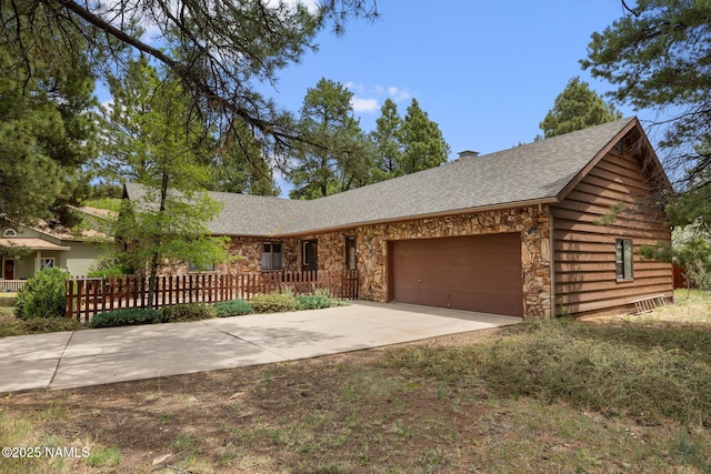 2468 N Strawberry Way, Flagstaff, AZ 86004 - ranch-style house featuring an attached garage, stone siding, driveway, a chimney, and roof with shingles