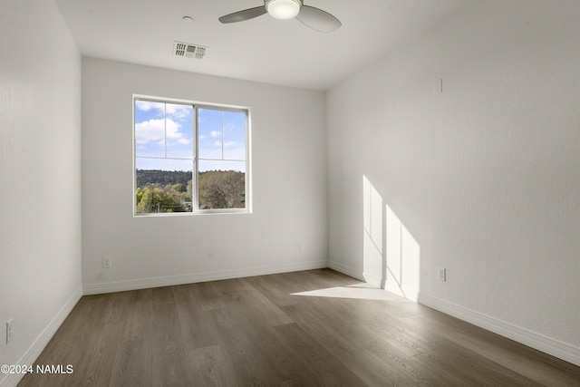 unfurnished room featuring hardwood / wood-style flooring and ceiling fan