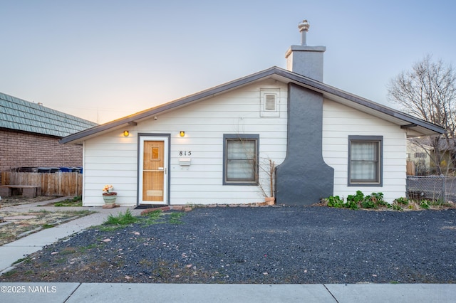 815 N Beaver St, Flagstaff, AZ 86001 - bungalow with fence and a chimney