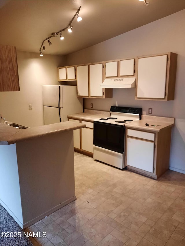 1185 W University Ave Unit 229, Flagstaff, AZ 86001 - kitchen with electric range oven, under cabinet range hood, freestanding refrigerator, a sink, and white cabinets