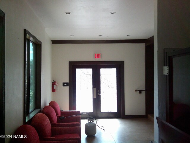 entryway featuring french doors