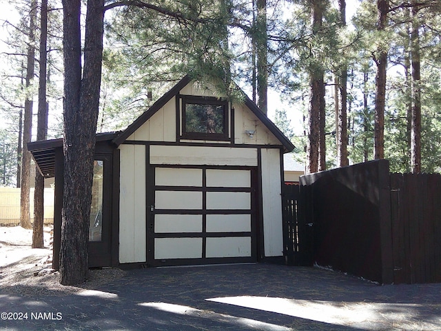 view of outdoor structure with a garage