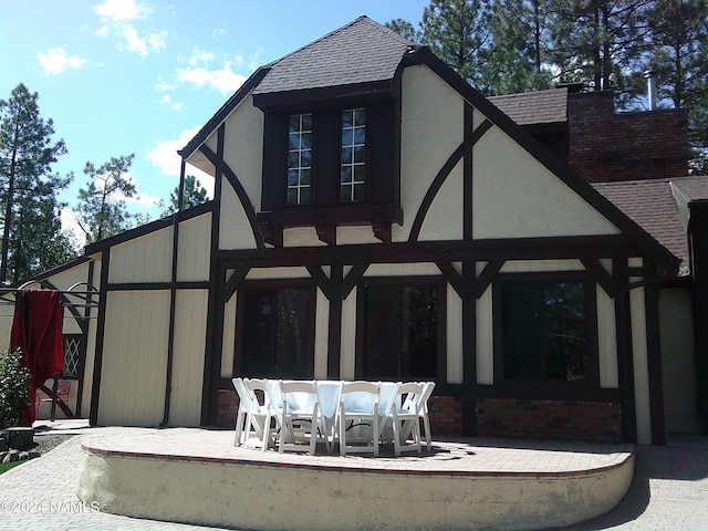 rear view of property with a patio