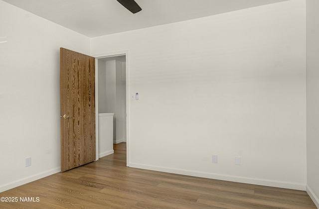 501 W Santa Fe Ave Unit 3, Flagstaff, AZ 86001 - empty room featuring baseboards, a ceiling fan, and wood finished floors