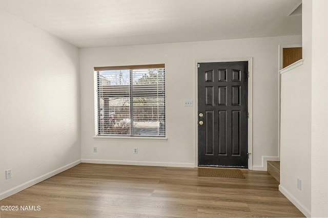 501 W Santa Fe Ave Unit 3, Flagstaff, AZ 86001 - foyer entrance featuring wood finished floors and baseboards