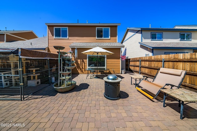 9129 W Arden Ln, Bellemont, AZ 86015 - fenced backyard with a patio