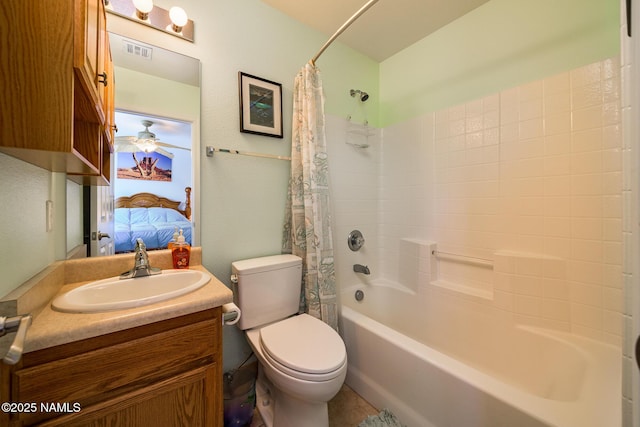 9129 W Arden Ln, Bellemont, AZ 86015 - ensuite bathroom featuring shower / bath combination with curtain, vanity, and toilet