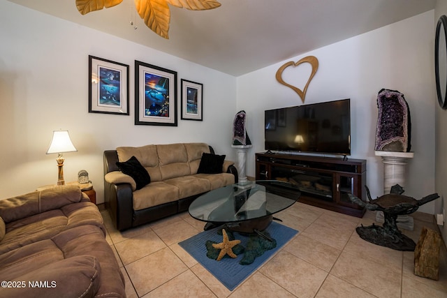 9129 W Arden Ln, Bellemont, AZ 86015 - tiled living room featuring a ceiling fan