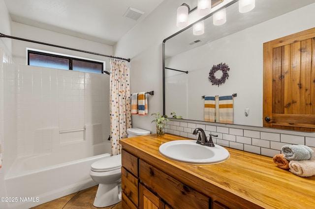 435 N Laramy Ln, Parks, AZ 86018 - bathroom with toilet, decorative backsplash, vanity, shower / tub combo, and tile patterned flooring