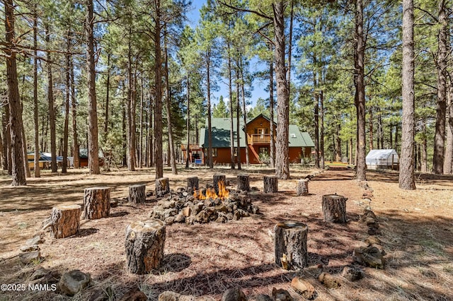 435 N Laramy Ln, Parks, AZ 86018 - view of yard with an outdoor fire pit