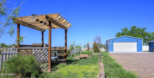 8134 Mclaws Ave, Joseph City, AZ 86032 - view of yard featuring a garage, an outdoor structure, a pergola, and a carport
