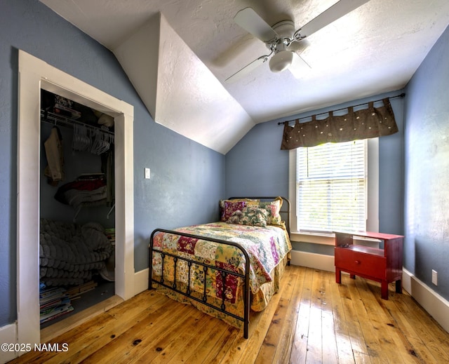 8134 Mclaws Ave, Joseph City, AZ 86032 - bedroom featuring hardwood / wood-style floors, lofted ceiling, and ceiling fan