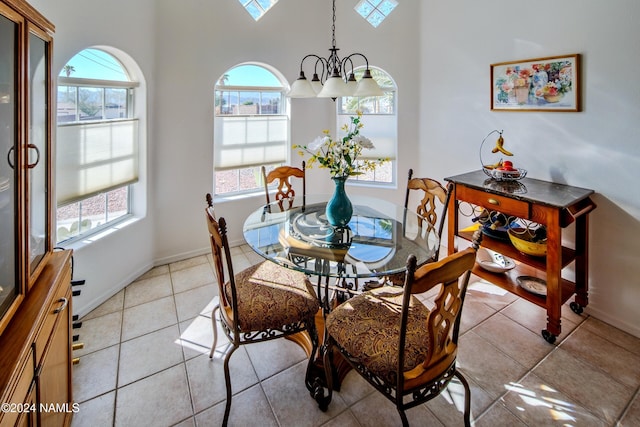 333 Chipeta Ln, Lake Havasu City, AZ 86403 - tiled dining area with an inviting chandelier and a towering ceiling