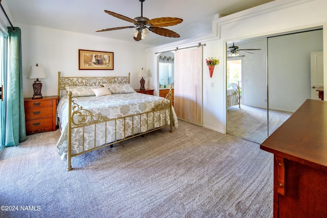 333 Chipeta Ln, Lake Havasu City, AZ 86403 - bedroom featuring ceiling fan, light colored carpet, a closet, and a barn door
