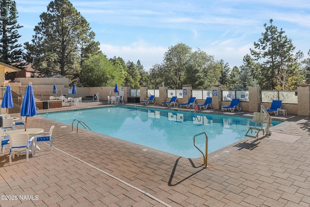 view of pool featuring a patio area