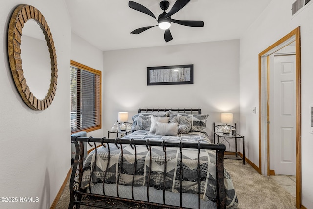 bedroom with light colored carpet, baseboards, a ceiling fan, and visible vents