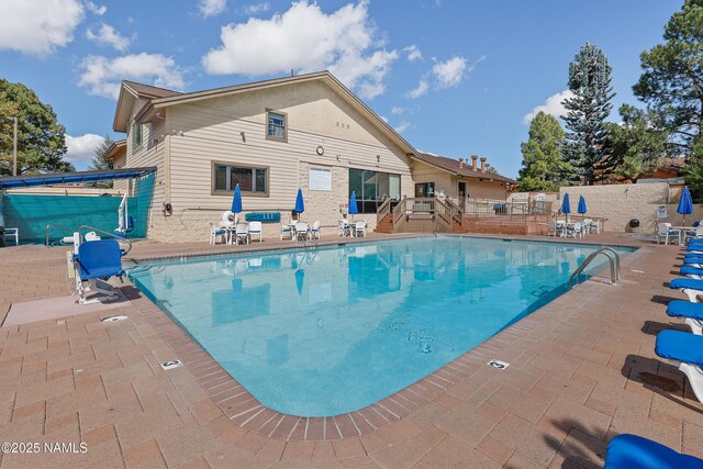 view of pool with a patio area