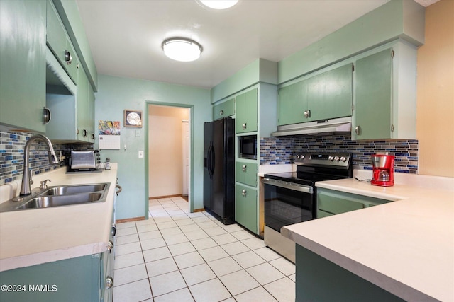 kitchen with black refrigerator with ice dispenser, built in microwave, decorative backsplash, sink, and electric range