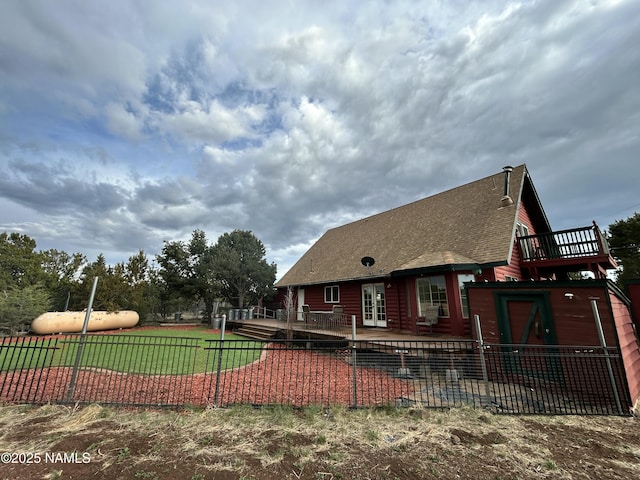 8120 N Cassity Trl, Williams, AZ 86046 - rear view of property featuring a shingled roof and a patio
