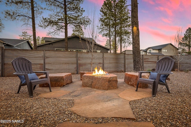 3600 W Modus Ln, Flagstaff, AZ 86001 - view of patio with a fire pit and a fenced backyard