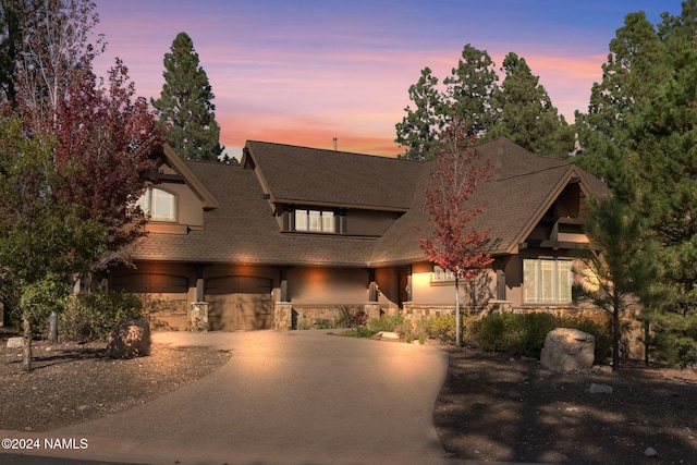 view of front of home with a garage