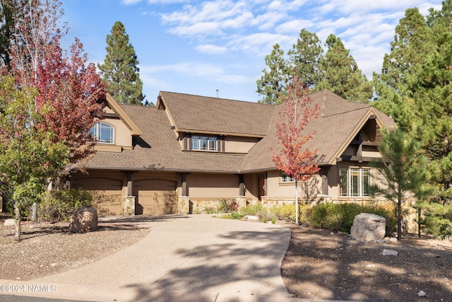 view of front of property featuring a garage