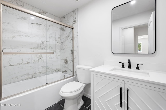 3540 N Walker St, Flagstaff, AZ 86004 - full bath featuring bath / shower combo with glass door, toilet, and vanity