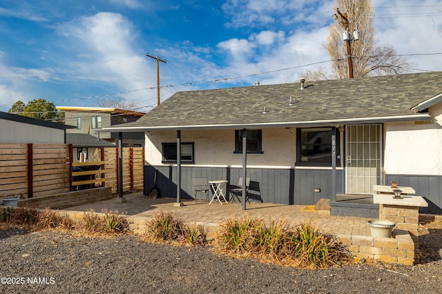 back of property featuring a patio area