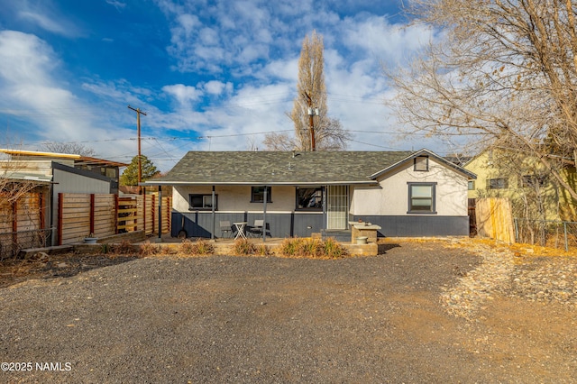 ranch-style house with covered porch