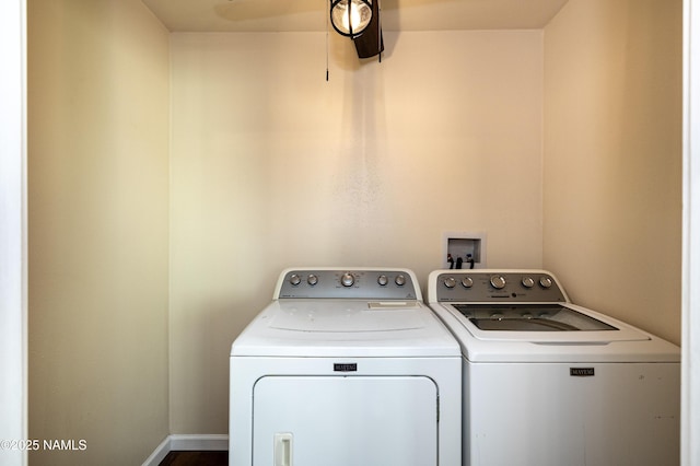 washroom featuring washer and dryer and ceiling fan