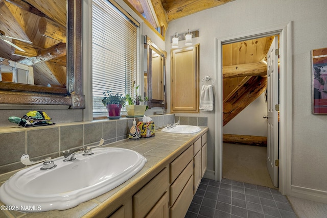 38 Cosnino Rd, Flagstaff, AZ 86004 - full bath with tile patterned floors, double vanity, and baseboards