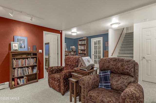 38 Cosnino Rd, Flagstaff, AZ 86004 - sitting room with rail lighting, carpet, stairs, and a textured wall
