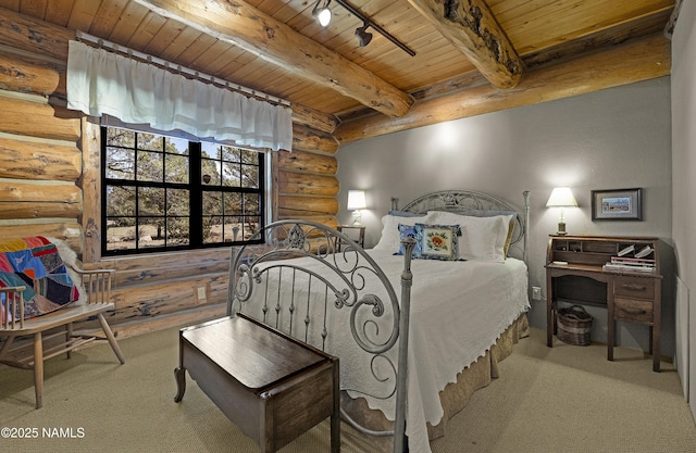38 Cosnino Rd, Flagstaff, AZ 86004 - bedroom with rustic walls, wood ceiling with exposed beams, carpet flooring, and rail lighting
