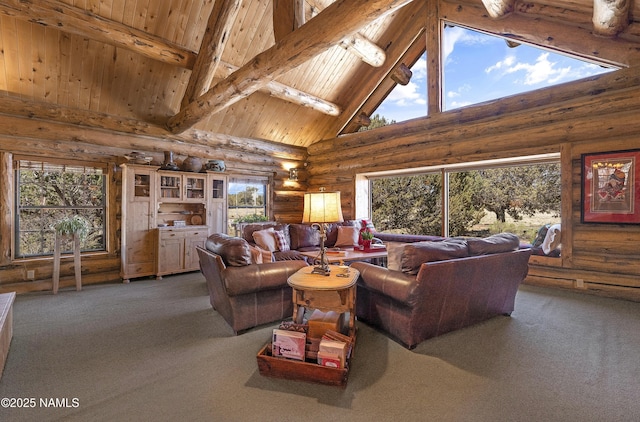 38 Cosnino Rd, Flagstaff, AZ 86004 - carpeted living room featuring high vaulted ceiling, log walls, plenty of natural light, and wood ceiling with exposed beams