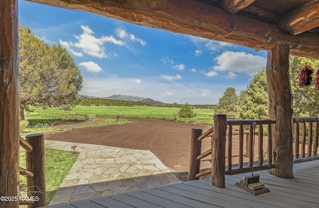 38 Cosnino Rd, Flagstaff, AZ 86004 - wooden terrace featuring a view of countryside and a mountain view