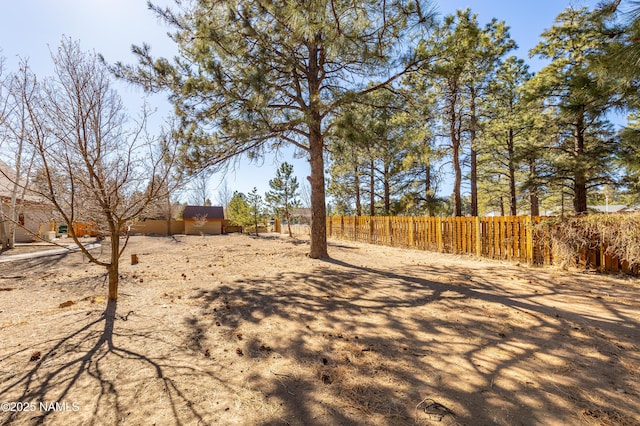 view of yard featuring fence