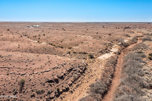 exterior space with a desert view