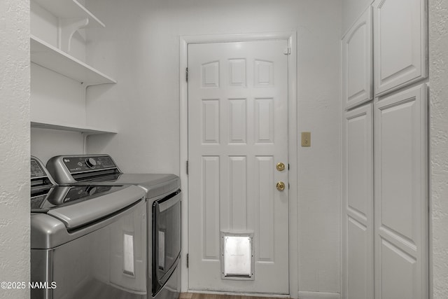 6320 N Mountaineer Rd, Flagstaff, AZ 86004 - laundry room featuring cabinet space and separate washer and dryer