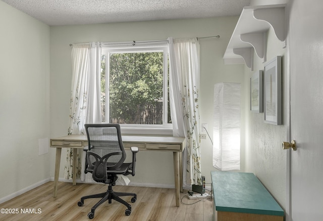 6320 N Mountaineer Rd, Flagstaff, AZ 86004 - office area with wood finished floors and a textured ceiling