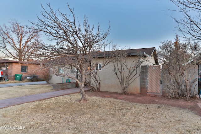 exterior space featuring stucco siding