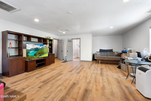 7530 N Rain Valley Rd, Flagstaff, AZ 86004 - living room featuring recessed lighting, light wood-style flooring, and baseboards