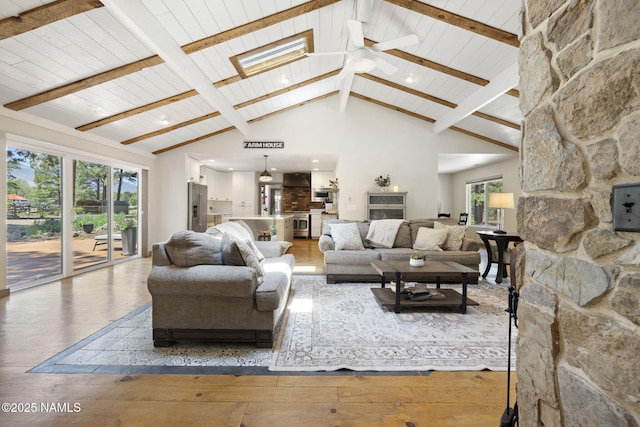 7530 N Rain Valley Rd, Flagstaff, AZ 86004 - living room with wood-type flooring, ceiling fan, high vaulted ceiling, wooden ceiling with exposed beams, and recessed lighting
