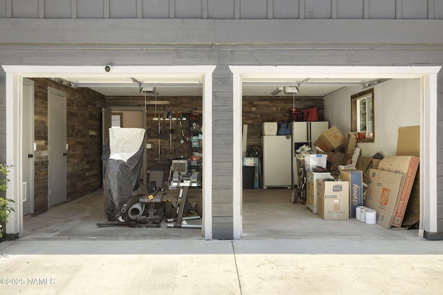 7530 N Rain Valley Rd, Flagstaff, AZ 86004 - garage featuring freestanding refrigerator