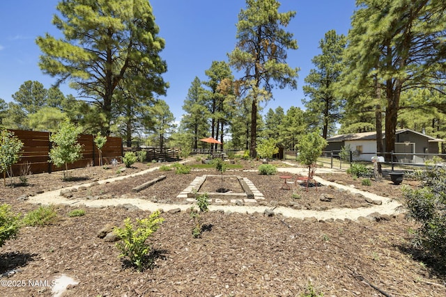 7530 N Rain Valley Rd, Flagstaff, AZ 86004 - view of yard featuring a vegetable garden