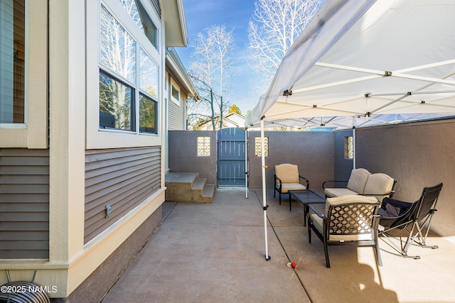 673 N Pine Cliff Dr, Flagstaff, AZ 86001 - view of patio with fence and a gate