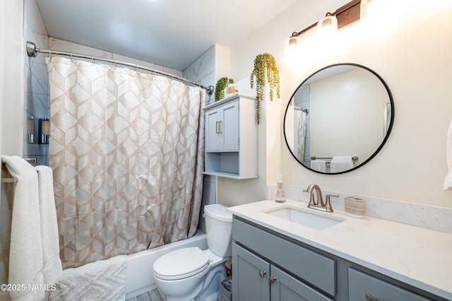 bathroom with toilet, shower / tub combo, and vanity