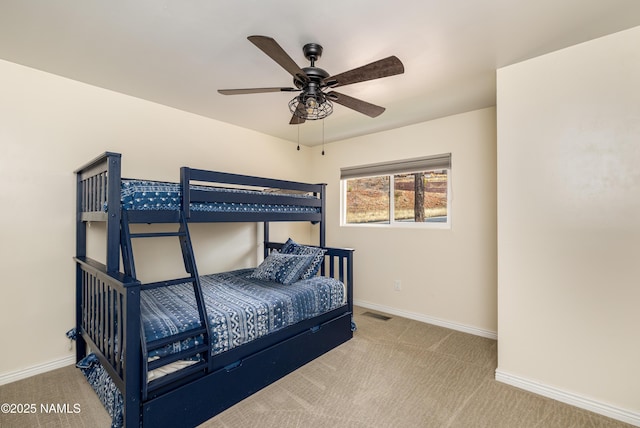 bedroom with visible vents, baseboards, and carpet flooring